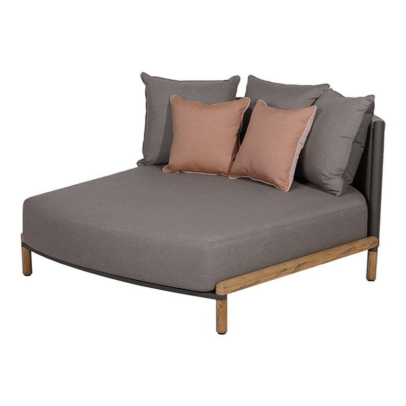 Gray upholstered bed with wooden legs and soft, taupe pillows. Modern, minimalist design with a neutral color palette.