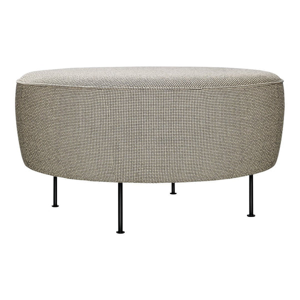Round ottoman in light gray textured fabric with black metal legs. Modern and versatile design for any living space.
