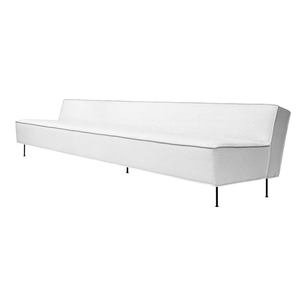 White minimalist sofa with sleek lines and a modern design, perfect for contemporary living spaces.