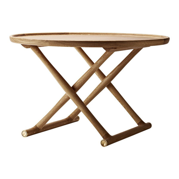 Round wooden table in light beige with a natural finish and crossed base design. Ideal for modern decor.