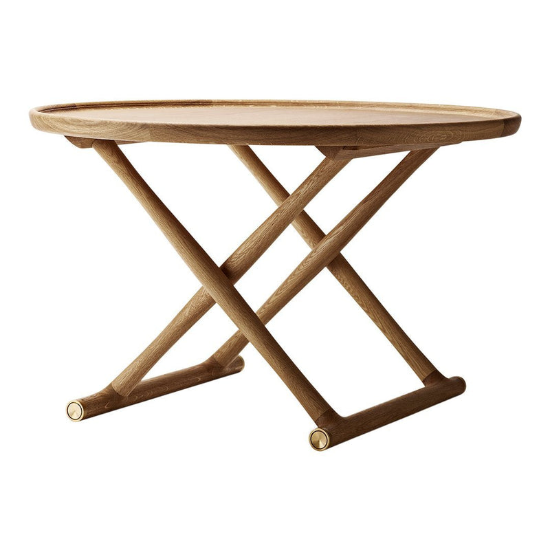 Round wooden table in light beige with a natural finish and crossed base design. Ideal for modern decor.