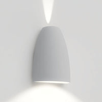 Sleek white wall lamp with a smooth, curved design and subtle light pattern. Perfect for modern home decor.