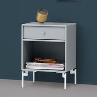 Stylish light gray nightstand with a smooth surface and white legs, featuring a minimalist design.
