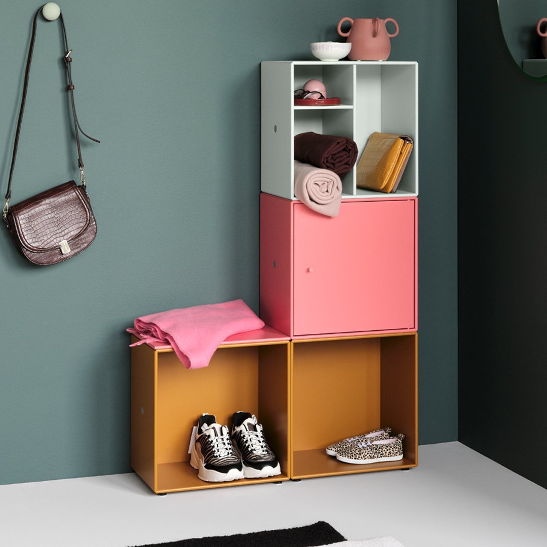 Colorful storage cabinet featuring mint green, pink, and mustard yellow with a modern geometric design.
