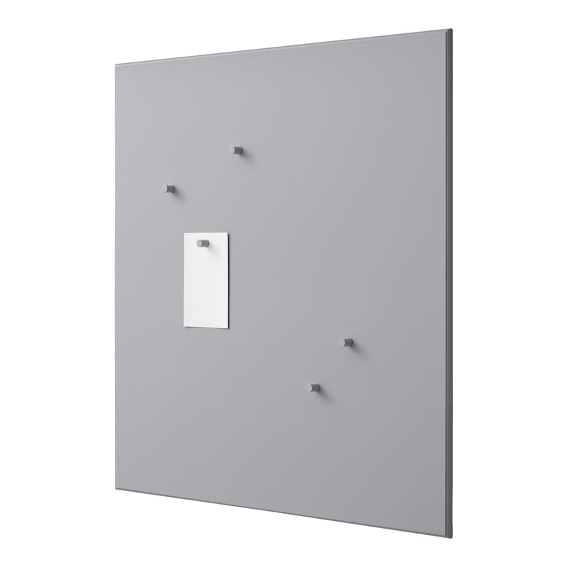 Gray wall panel with a smooth finish, featuring circular hooks and a white note holder. Minimalist and modern design.