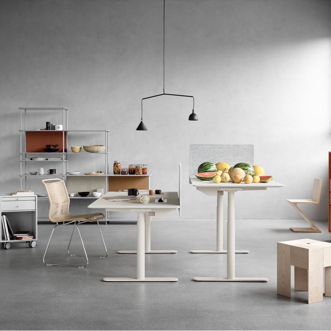 Modern workspace featuring beige and light gray tones, minimalist design, and natural wood accents.