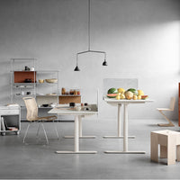 Modern workspace featuring beige and light gray tones, minimalist design, and natural wood accents.