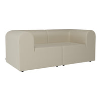 Beige modular sofa with a smooth, matte texture and rounded edges, perfect for modern interiors.