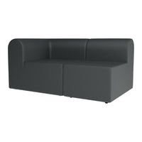 Modern dark gray sectional sofa with textured fabric and sleek lines, perfect for contemporary interiors.