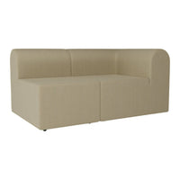Beige upholstered sofa with a smooth, minimalist design, featuring a subtle texture and no visible patterns.