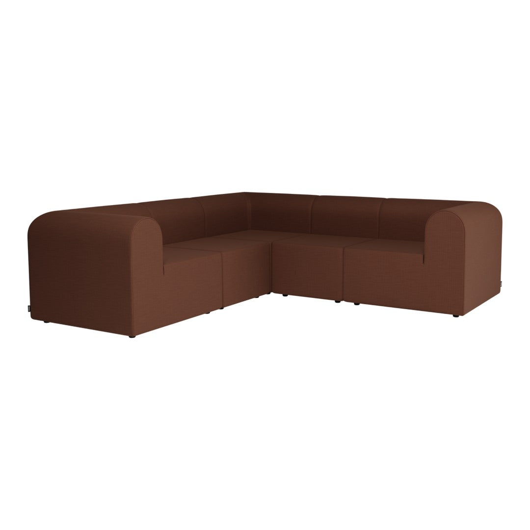 Brown textured sectional sofa in a modern design, featuring curved arms and a block-style structure.
