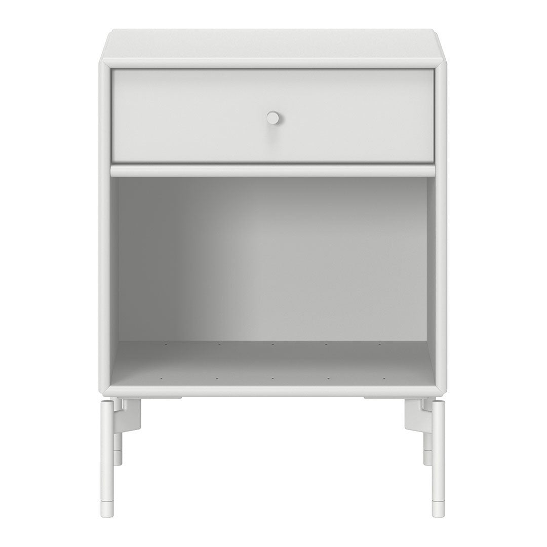 Modern white nightstand with clean lines, featuring a smooth surface and a minimalist design, perfect for any decor.