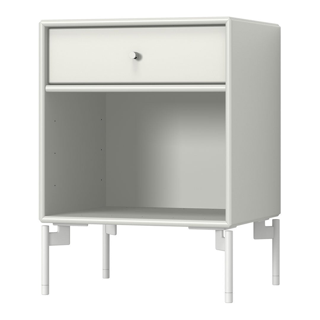 Minimalist white nightstand with a single drawer and open shelf, featuring a sleek, modern design.