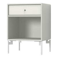 Minimalist white nightstand with a single drawer and open shelf, featuring a sleek, modern design.