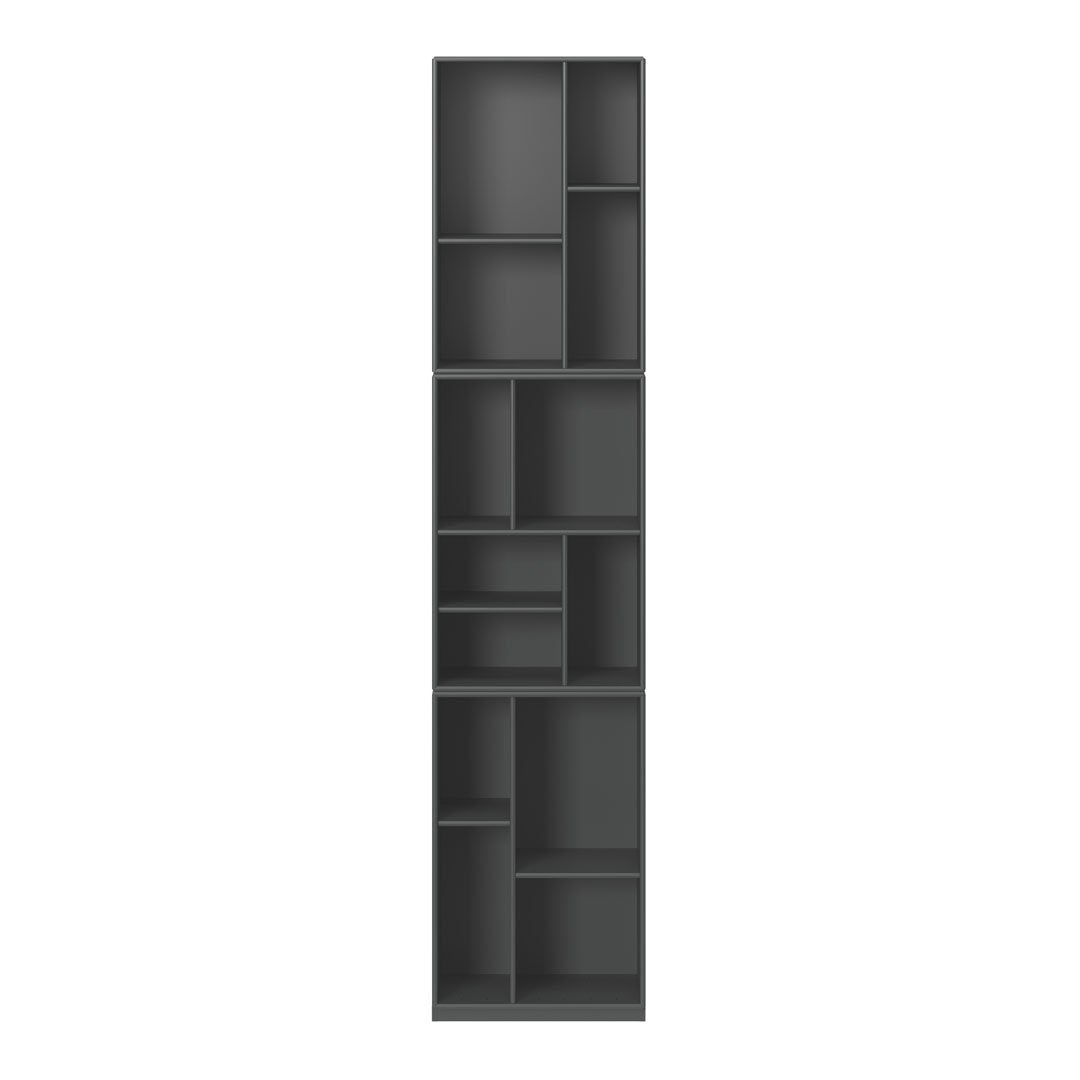 Tall, modern bookshelf in dark gray with a geometric pattern of open and closed shelves.