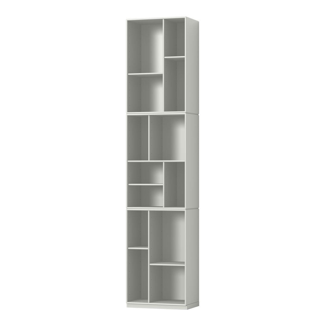 Tall white bookshelf with a minimalist design, featuring multiple open shelves and smooth surfaces.
