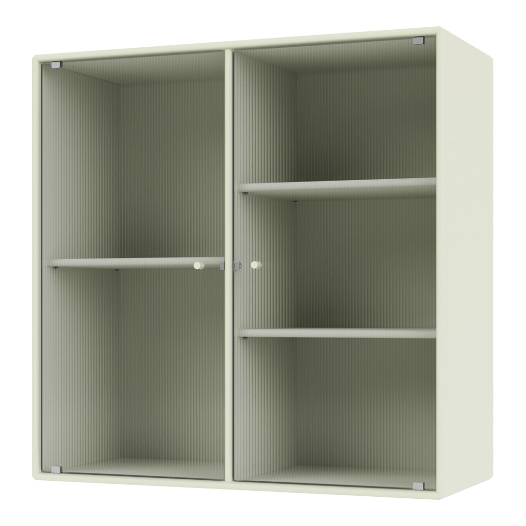 Light green shelving unit with vertical ribbed pattern and minimalistic design, featuring open and closed compartments.