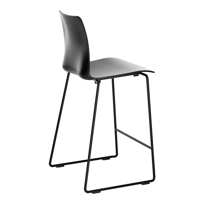 Sleek black bar stool with minimalist design, featuring a smooth, curved seat and slender metal legs.