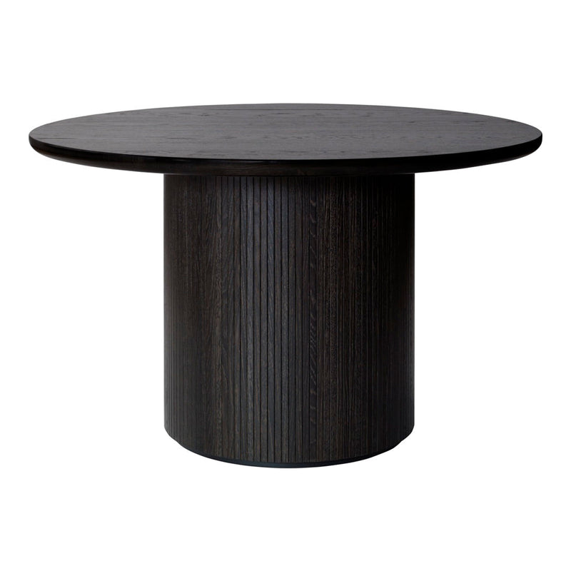 Round black dining table with a textured ribbed base, showcasing a modern, sleek design. Ideal for contemporary spaces.