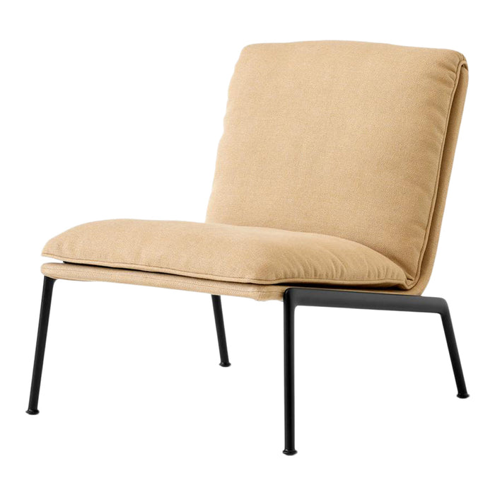 Beige cushioned chair with a sleek black metal frame, featuring a minimalist design and soft texture.