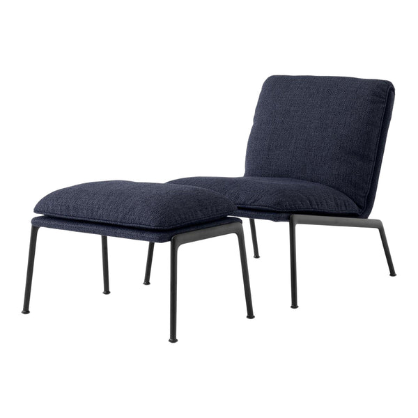 Navy blue upholstered chair with sleek black metal legs, featuring a minimalist design and soft, textured cushions.