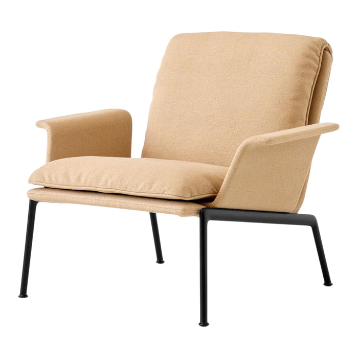 Tan fabric lounge chair with sleek black metal legs, offering a modern and minimalist design.