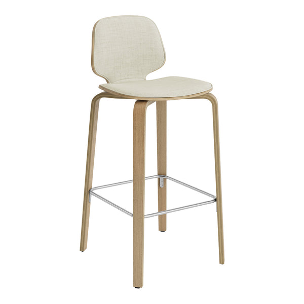 Cream-colored bar stool with a minimalist design and natural wood legs, featuring a subtle textured pattern.