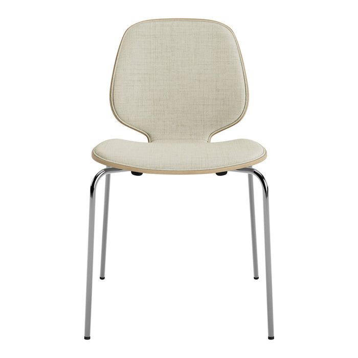 Light beige chair with a textured fabric seat and minimalistic chrome legs, perfect for modern decor.