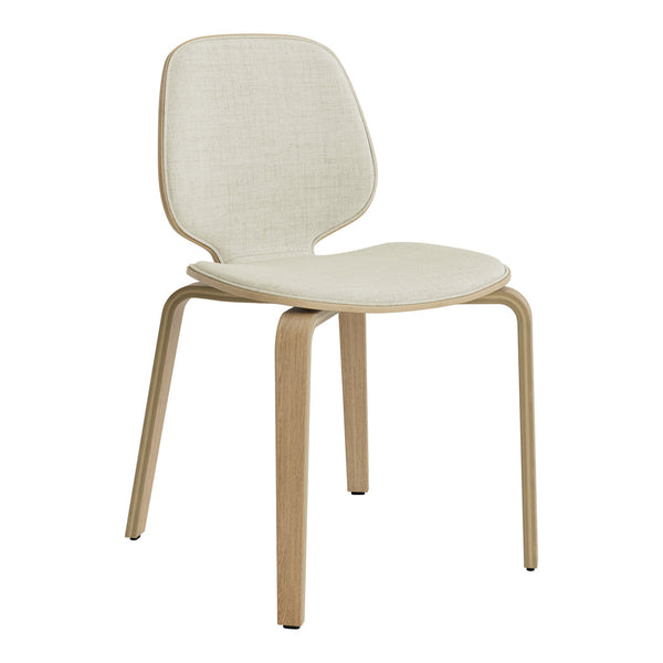 Light beige upholstered chair with a minimalist design and natural wood legs. Perfect for modern decor.