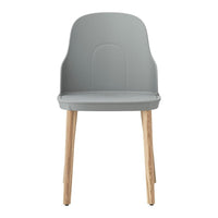 Modern gray chair with smooth, minimalist design and natural wood legs. Perfect for stylish interiors.