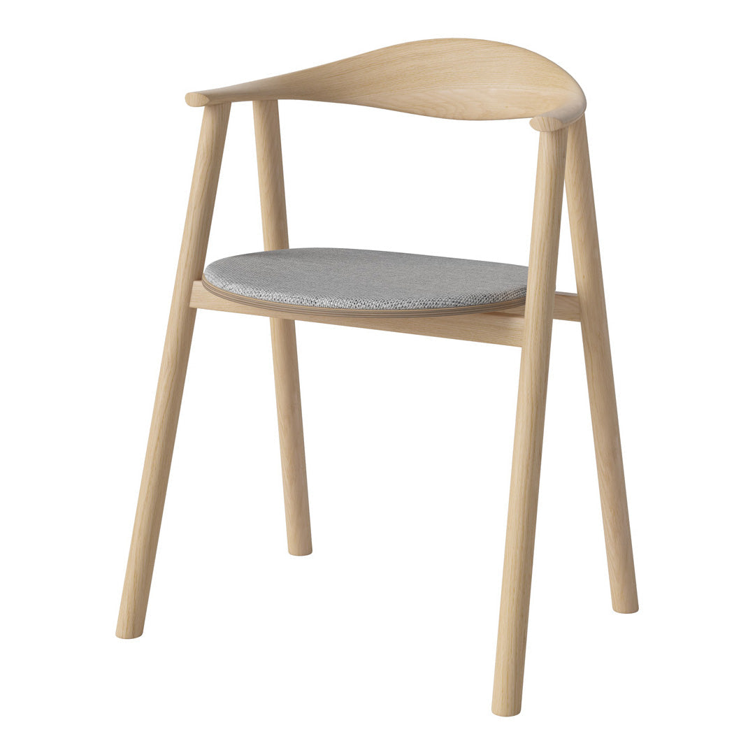 Light wood chair with a natural finish and a soft gray fabric seat, showcasing a simple, modern design.