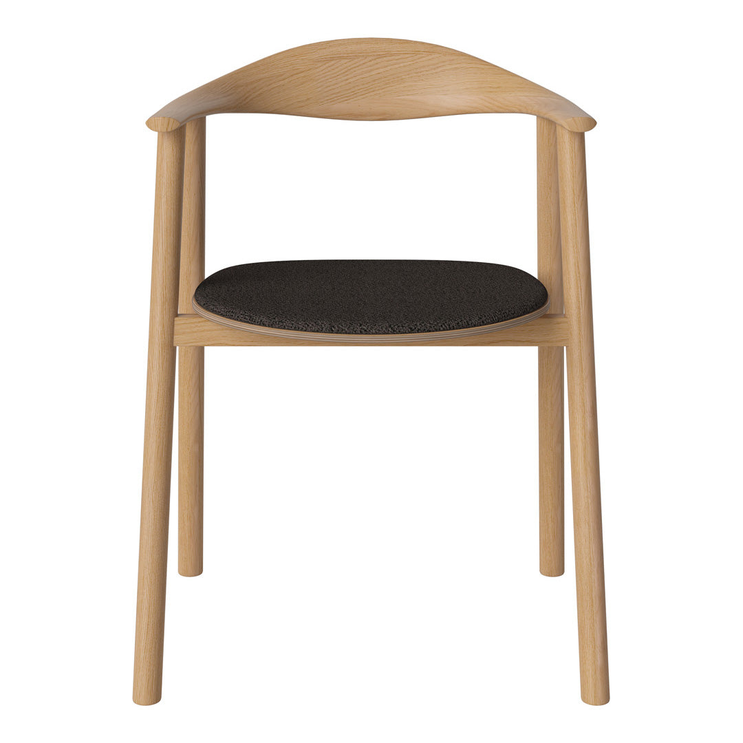 Light wood chair with a smooth finish and a dark fabric seat, featuring clean lines and minimalistic design.