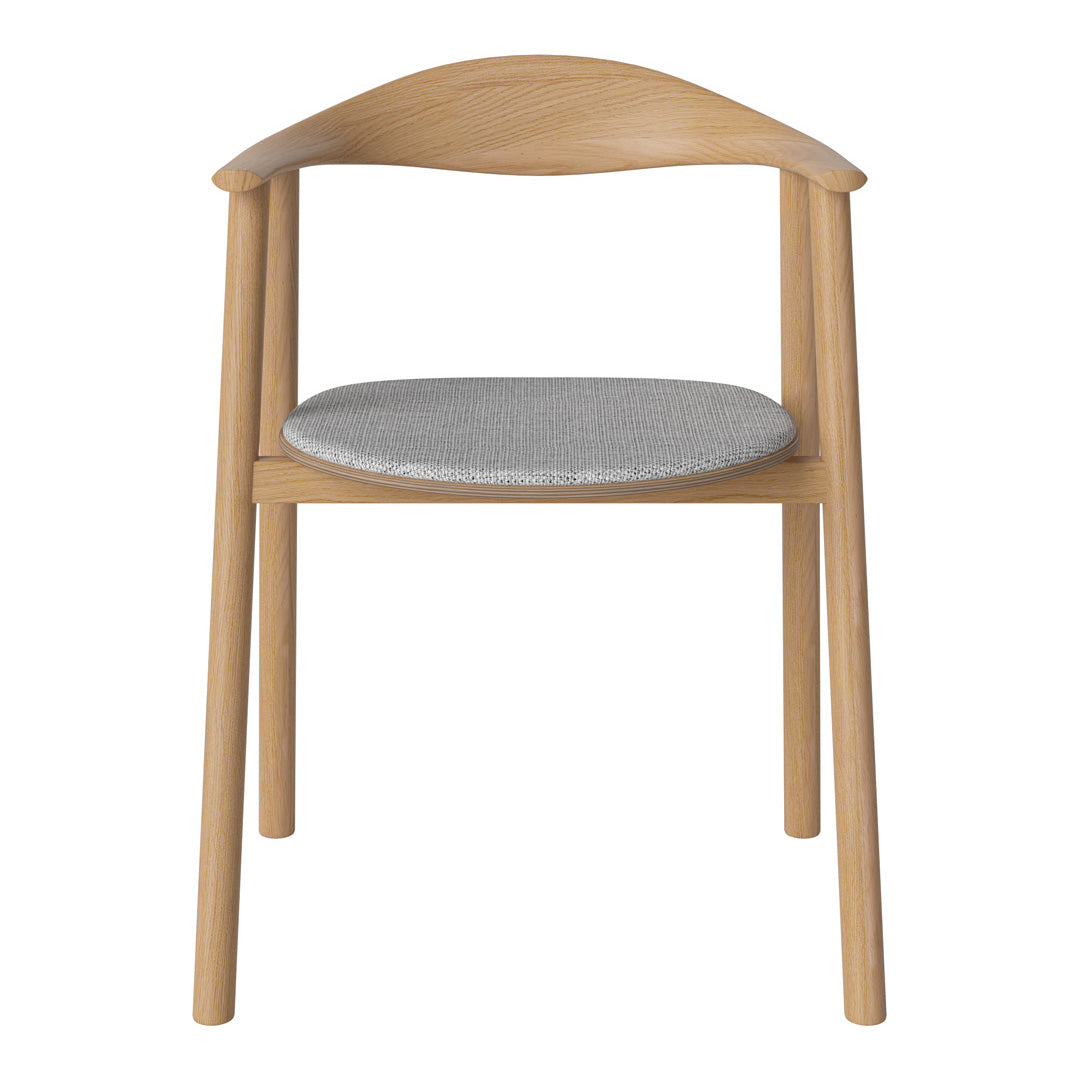 Light wood chair with a gray fabric cushion and a simple, modern design featuring smooth curves and clean lines.