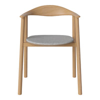 Light wood chair with a gray fabric cushion and a simple, modern design featuring smooth curves and clean lines.