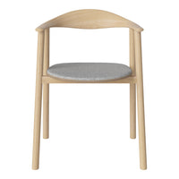 Light wood chair with a smooth, curved back and a soft gray upholstered seat. Modern and minimalist design.