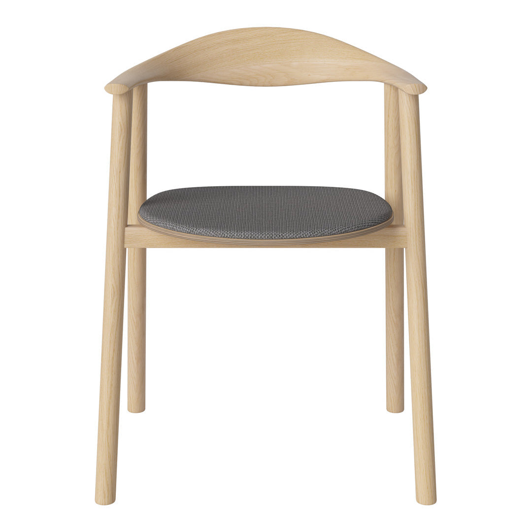 Light wood chair with a smooth finish and a dark gray fabric seat. Minimalist design with clean lines.