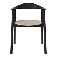 Black wooden chair with a cream fabric seat, minimalist design and sleek lines. Perfect for modern aesthetics.