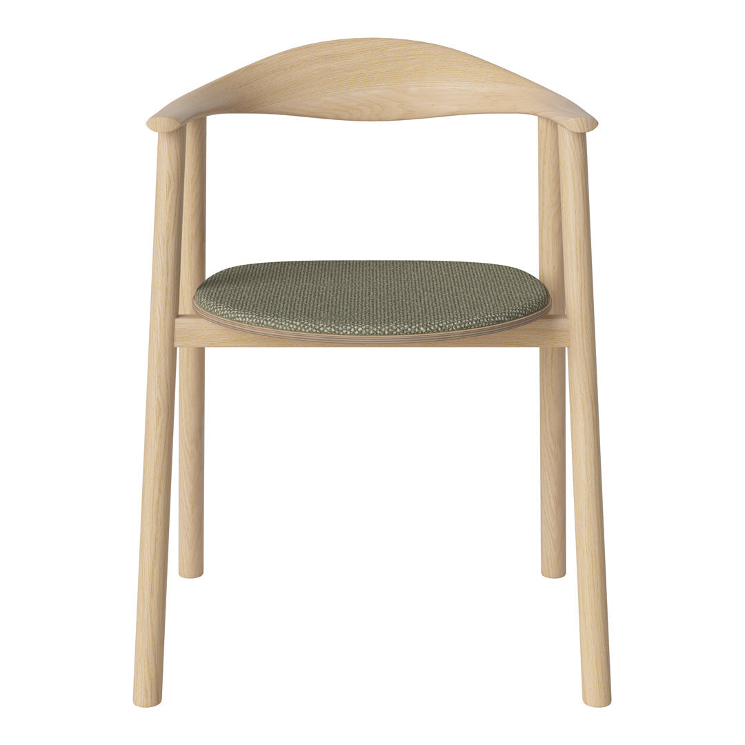 Natural wood chair with a light finish and a subtle olive green fabric seat. Simple, modern design.