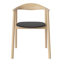 Light wood chair with a smooth, natural finish and a sleek black cushion seat. Minimalist design and modern appeal.