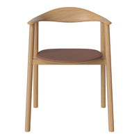 Light wood chair with a smooth finish and a round brown leather seat cushion. Minimalist design, natural colors.