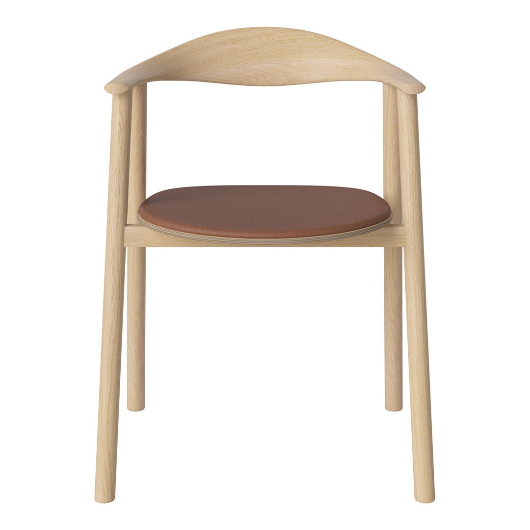 Natural wood chair with a smooth light finish and a warm brown leather seat, showcasing minimalist design and simple elegance.