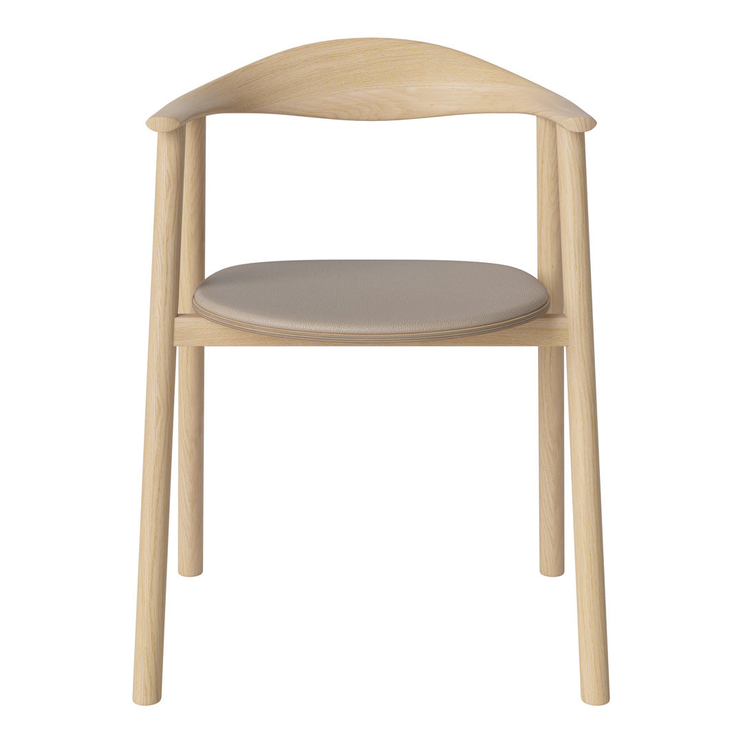 Light wood chair with a curved back and a smooth gray seat, showcasing a minimalist design and natural finishes.