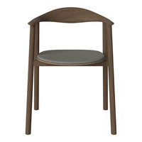 Brown wooden chair with a smooth, gray padded seat, featuring a minimalist design and curved backrest.