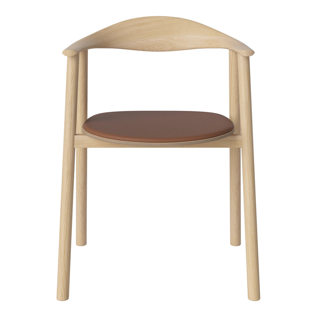 Natural wood chair with a light finish and a rich brown leather seat, featuring a minimalist design.