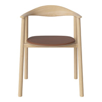 Natural wood chair with a light finish and a rich brown leather seat, featuring a minimalist design.