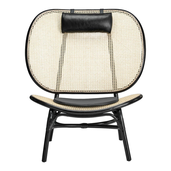 Black and natural woven rattan chair with a sleek design and curved patterns, perfect for modern decor.