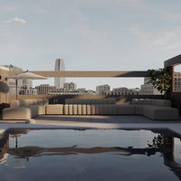 Beige outdoor sectional sofa with subtle texture, surrounded by greenery and overlooking a reflective pool under a clear sky.