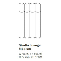 Minimalist medium lounge in soft neutral tones and smooth, cylindrical patterns for a sleek, modern aesthetic.