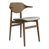 Wooden chair with a light brown finish and a cream-colored seat, featuring a minimalist design and smooth curves.