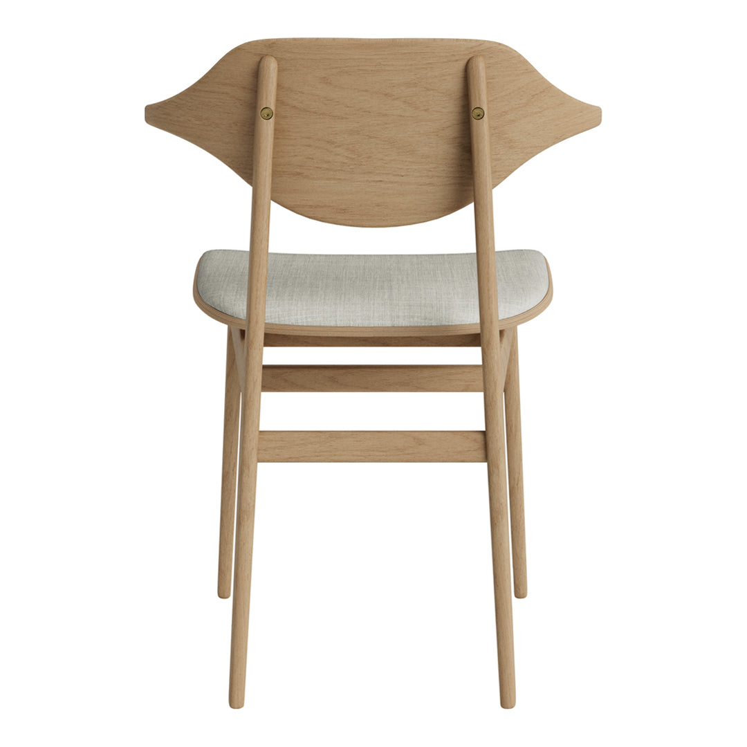 Natural wood chair with a light beige cushion and elegant curved back design, showcasing a minimalist style.
